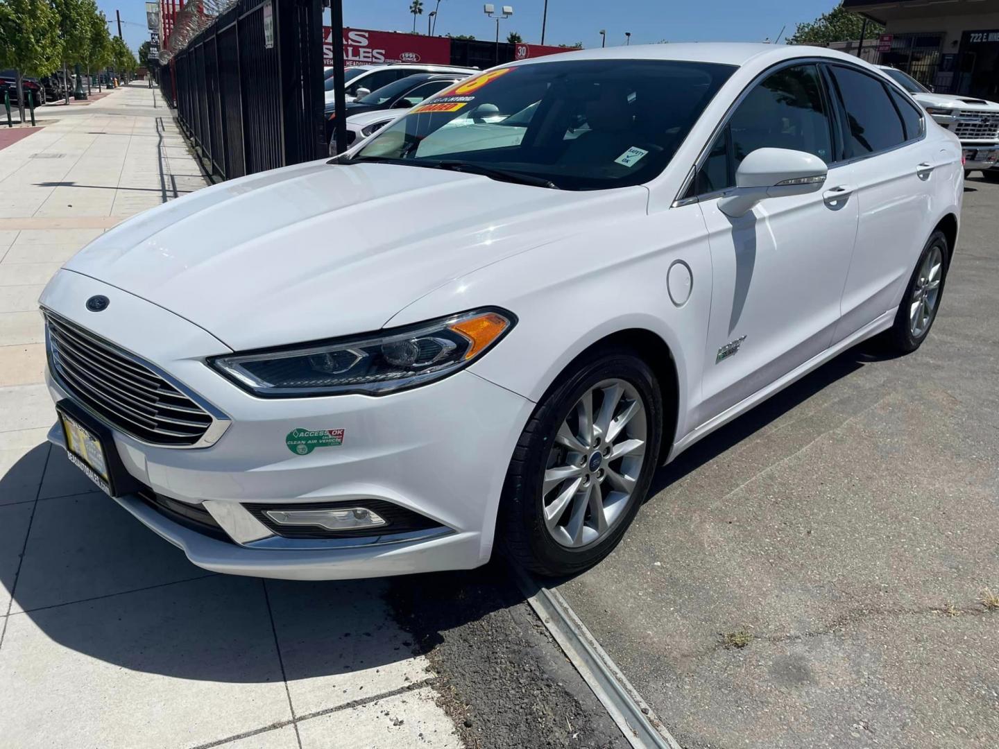 2018 WHITE /BLACK Ford Fusion Energi Titanium (3FA6P0SU6JR) with an 2.0L L4 DOHC 16V HYBRID engine, CVT transmission, located at 744 E Miner Ave, Stockton, CA, 95202, (209) 944-5770, 37.956863, -121.282082 - PLUS TAXES AND FEES - Photo#3